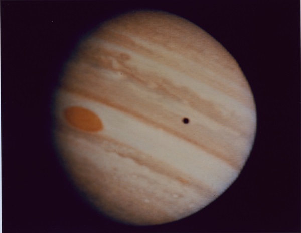 Pioneer 10's photo of Jupiter which shows the Giant Red Spot and the shadow of the moon Io